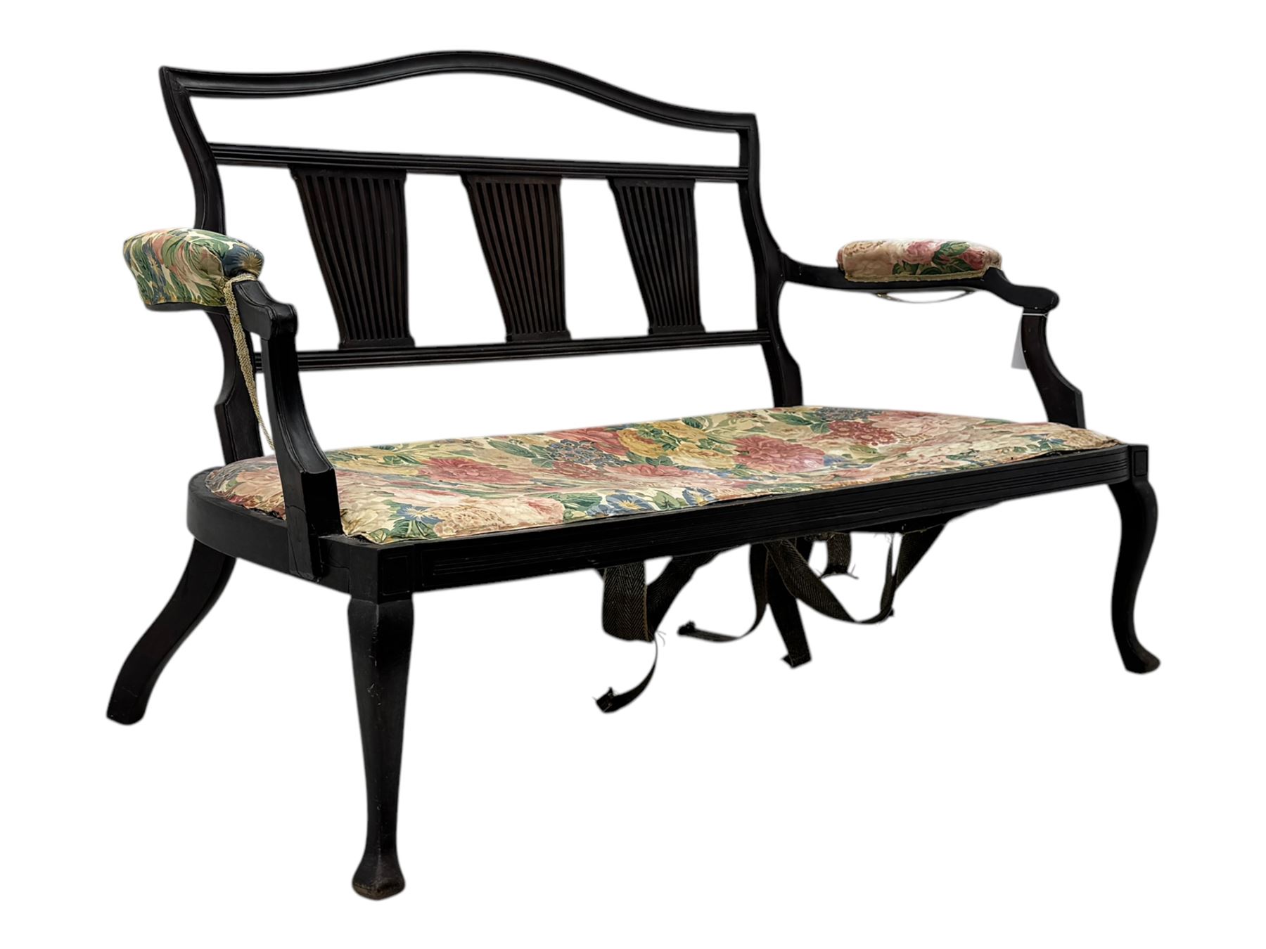 Edwardian mahogany three seater settee, upholstered in floral fabric. Shield back with padded armrests and cabriole legs  