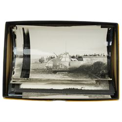 Early 20th century photograph album and contents of approximately 200 photographs and postcards including Alexandra Palace, Isle of Wight, views of Belgaum, India 1917, Palestine and Syria 1917-1919 etc, number of military glass slides and loose photographs