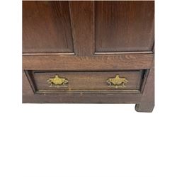 18th century oak mule chest, four panelled front, the interior fitted with candle box, two fall front drawers, stile supports