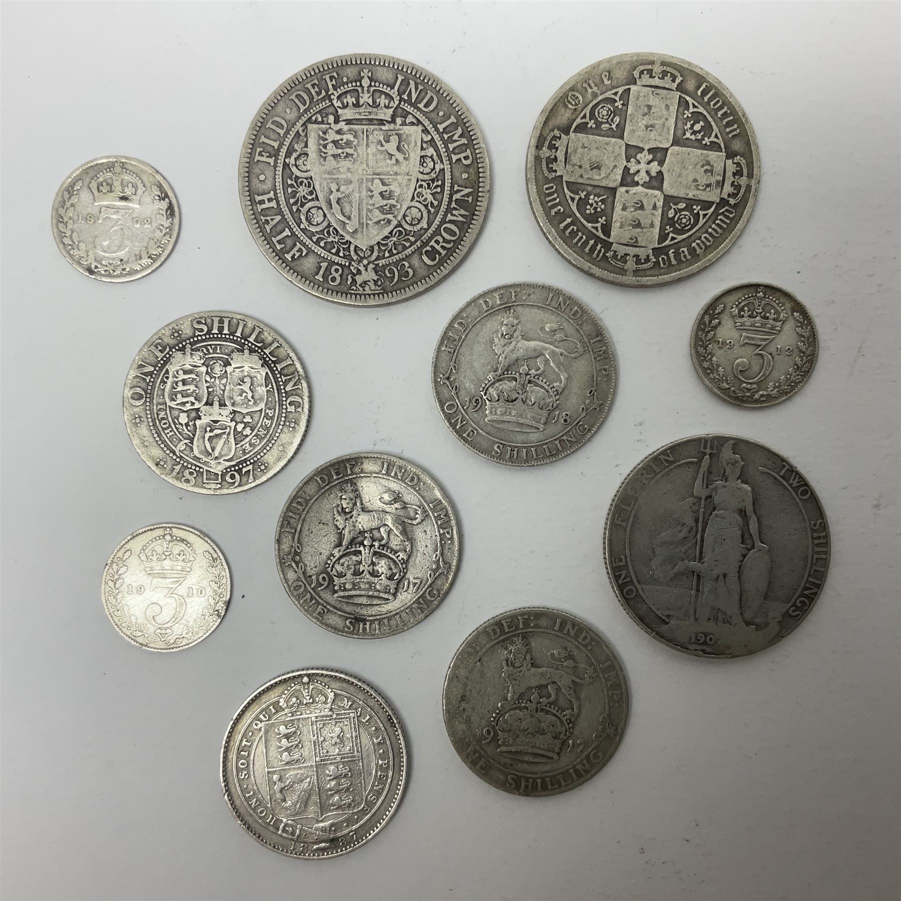 Approximately 65 grams of Great British pre 1920 silver coins and approximately 230 grams of pre 1947 silver coins, including King George V 1935 crown and two King George VI 1937 crowns