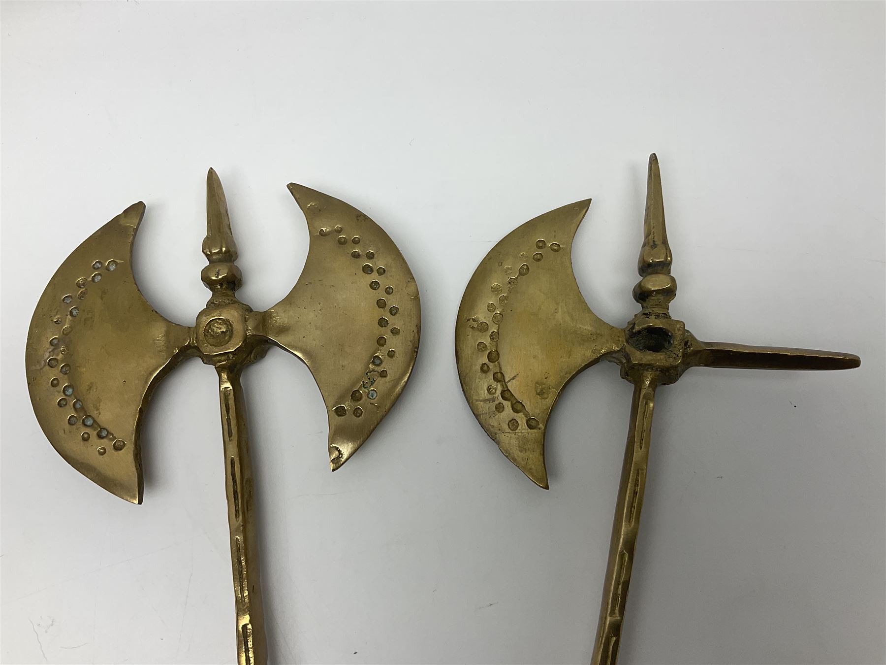 Ornamental cast-brass double-headed axe, together with another similar, H44cm