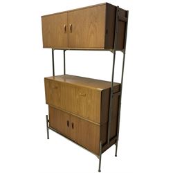 Remploy - mid-20th century teak sectional wall display unit or room divider, raised double cupboard section, central fall front section, and lower double cupboard section