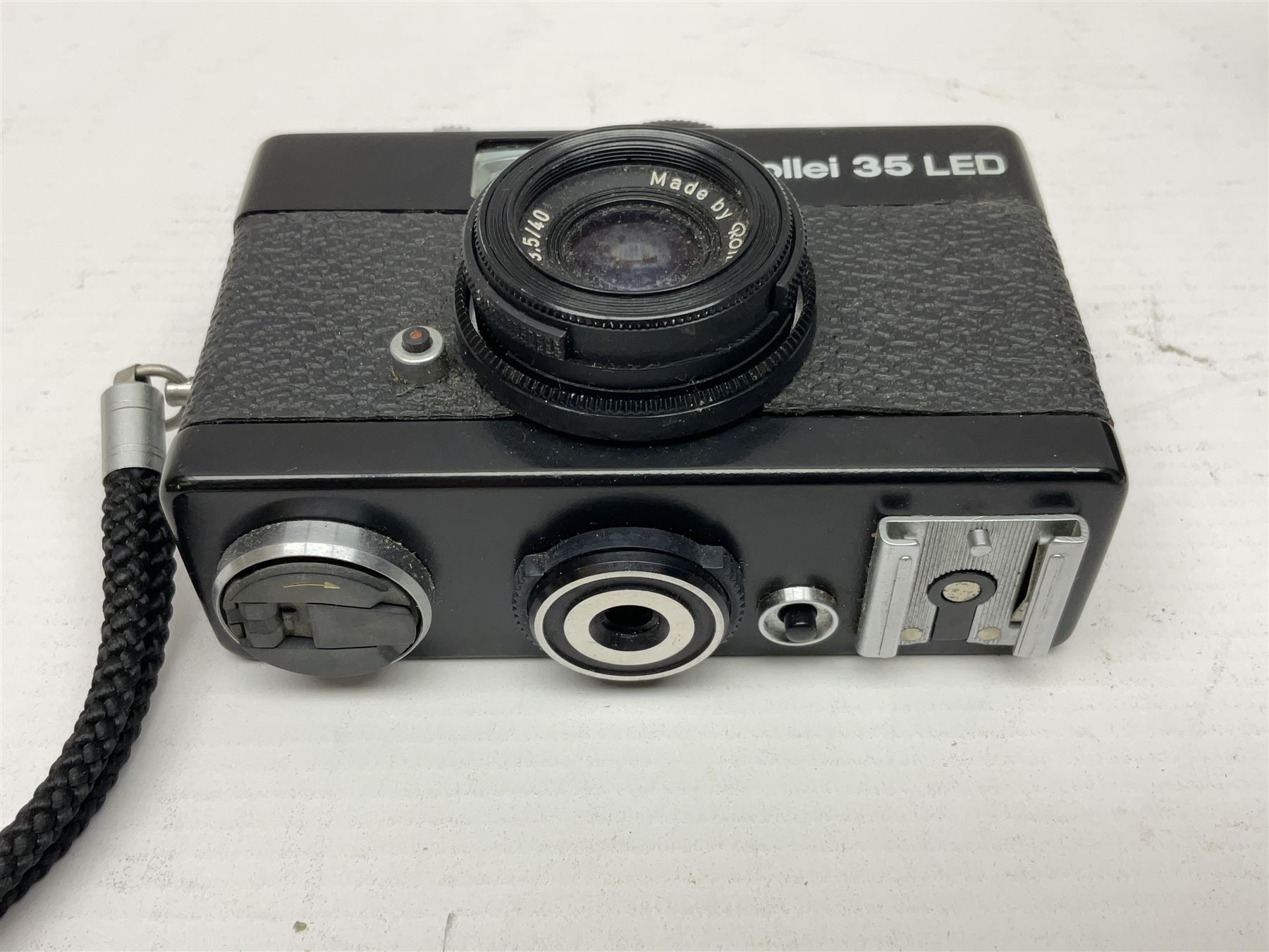 Three Rollei cameras, to include a Rollei 35 LED camera, with Triotar 3.5/40 lens and two Rollei XF 35 cameras, each with Sonnar 2.3/40 lenses