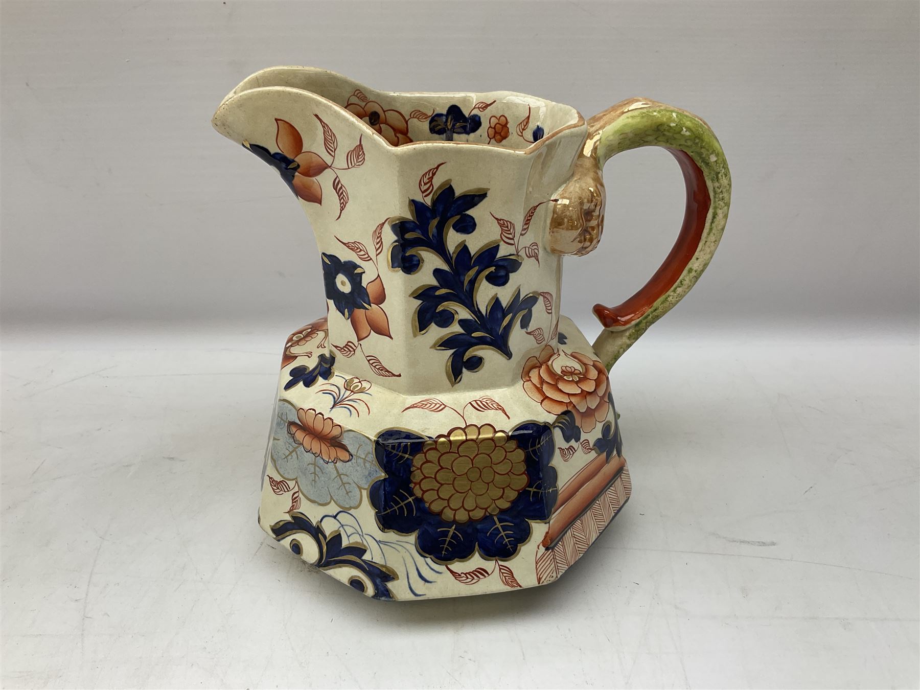 19th century ironstone wash jug and bowl set decorated in the Imari palette, together with two further smaller ironstone jugs similarly decorated, bowl D35cm