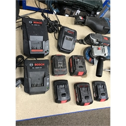 A quantity of Bosch Professional power tools including the GSB 18-2LI plus drill, GOP18V V-EC multi tool, GWS 18V-LI angle grinder, GDR 18-Li drill and a GSA 18 V-LI reciprocating saw with carry bag