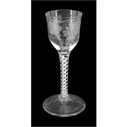 Late 18th century drinking glass, the ogee bowl etched with fruiting vines and bird in flight upon a double series opaque twist stem and conical foot, H15cm
