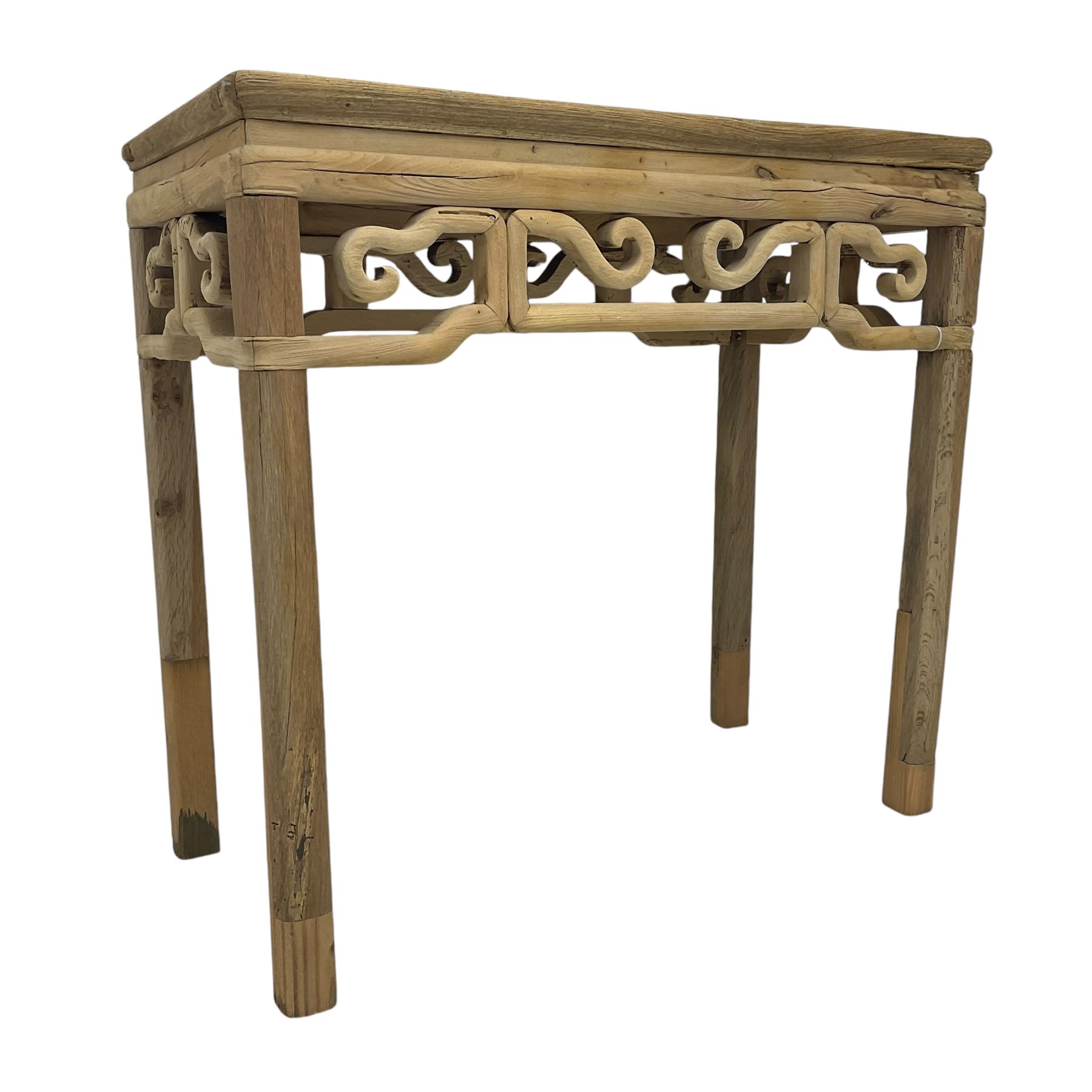 Chinese Ming design elm side table, rectangular top over shaped frieze rails, on square supports with curved outer edge 