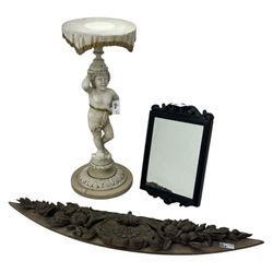 Early 20th century figural lamp, modelled as a standing cherub on a circular plinth base, ...