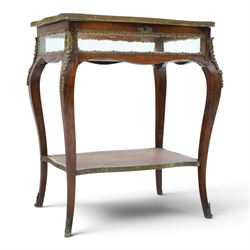 Louis XV style rosewood and marquetry bijouterie table,  glazed hinged top within a floral marquetry border and gilt metal moulded edge, above glazed sides and a baize lined interior, raised on cabriole legs with gilt metal mounts and sabots, united by an undertier