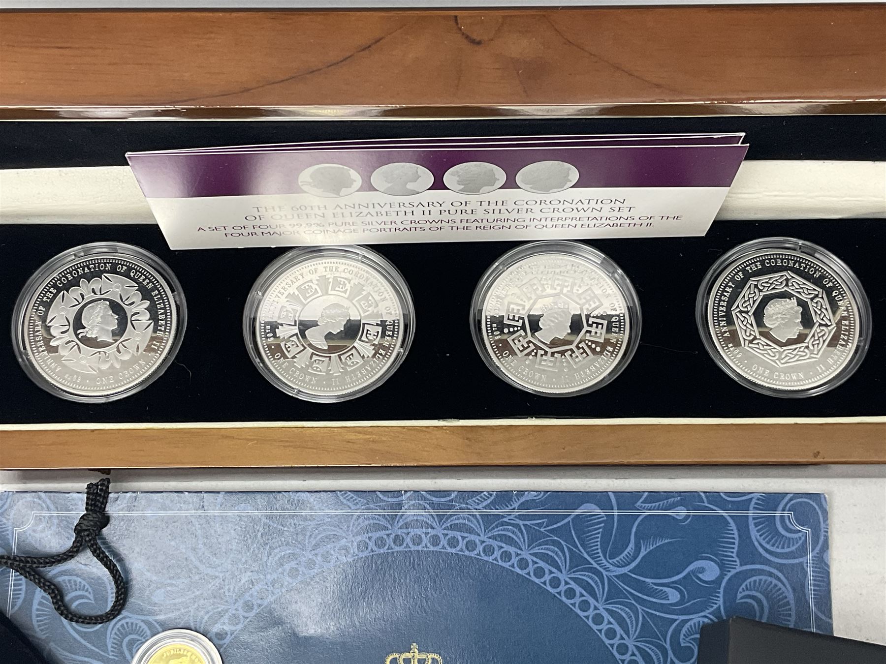Commemorative Tristan Da Cunha coins including 2013 'The 60th Anniversary of the Coronation of Queen Elizabeth II Pure Silver Crown Set' cased with certificate,  2014 'World War I Silver Commemorative' one crown cased with certificate, 9ct gold 2012 half crown approximately 1 gram etc