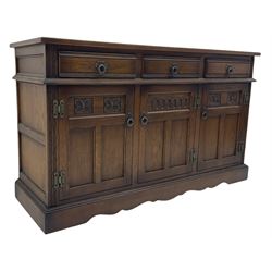 Old Charm Tudor style oak three drawer sideboard