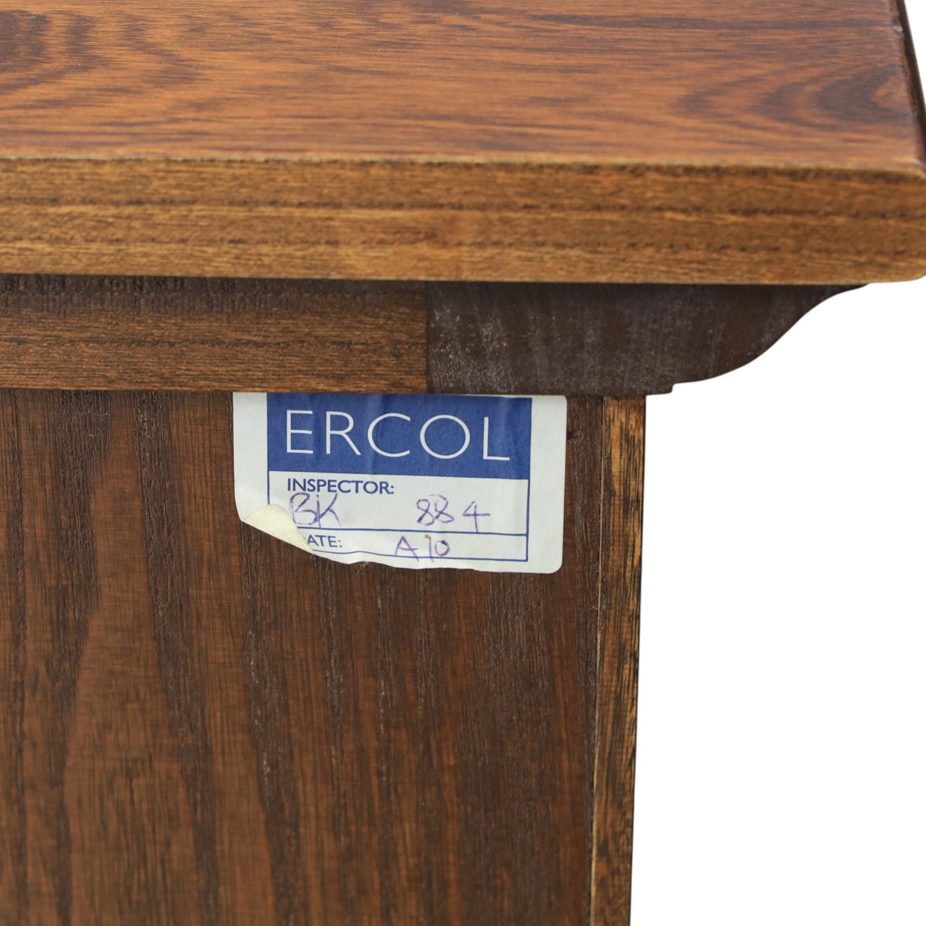 Ercol - elm dresser sideboard, fitted with four drawers and four cupboards with carved detail, drawer featuring cutlery slide