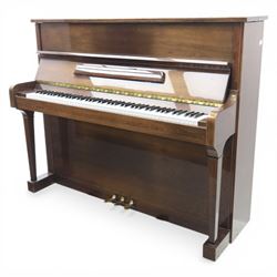 Bluthner of Leipzig upright piano, mahogany case with 88 keys and three brass pedals