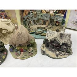 Twenty three Lilliput Lanes, including Village School, Lace's Shoe Shop, Cockles & Muscles, Scotland the Brave etc, together with The Leonardo Collection Paint Box Poppets and Gullivers World magazines 