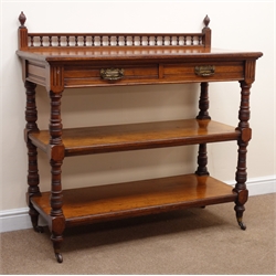  Edwardian mahogany dumb waiter, raises gallery back with finials, two drawers, turned supports joined by two solid under tiers on castors, W123cm, H122cm, D54cm  