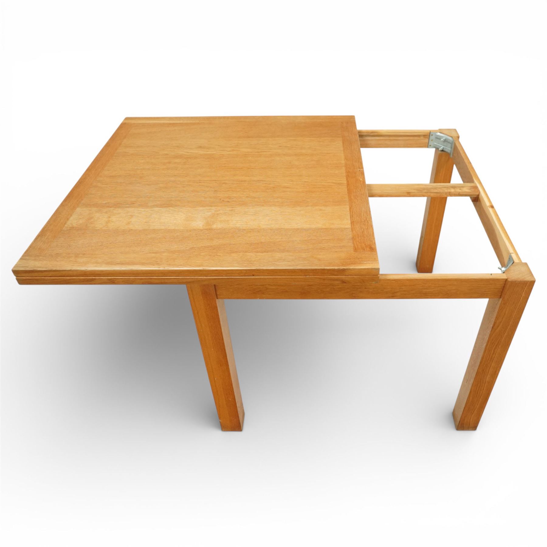 Laura Ashley - extending oak dining table, rectangular top with sliding hinged leaf, raised on square section legs