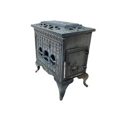 Poeles Nanquette - Art Deco 'Phebus' French enamel wood burning stove, indigo colour with pierced scrollwork decoration and acanthus leaves, on cabriole supports