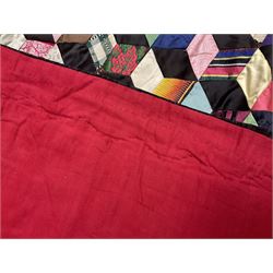19th Century silk and satin tumbling blocks pattern patchwork quilt with black border 228cm X 196cm