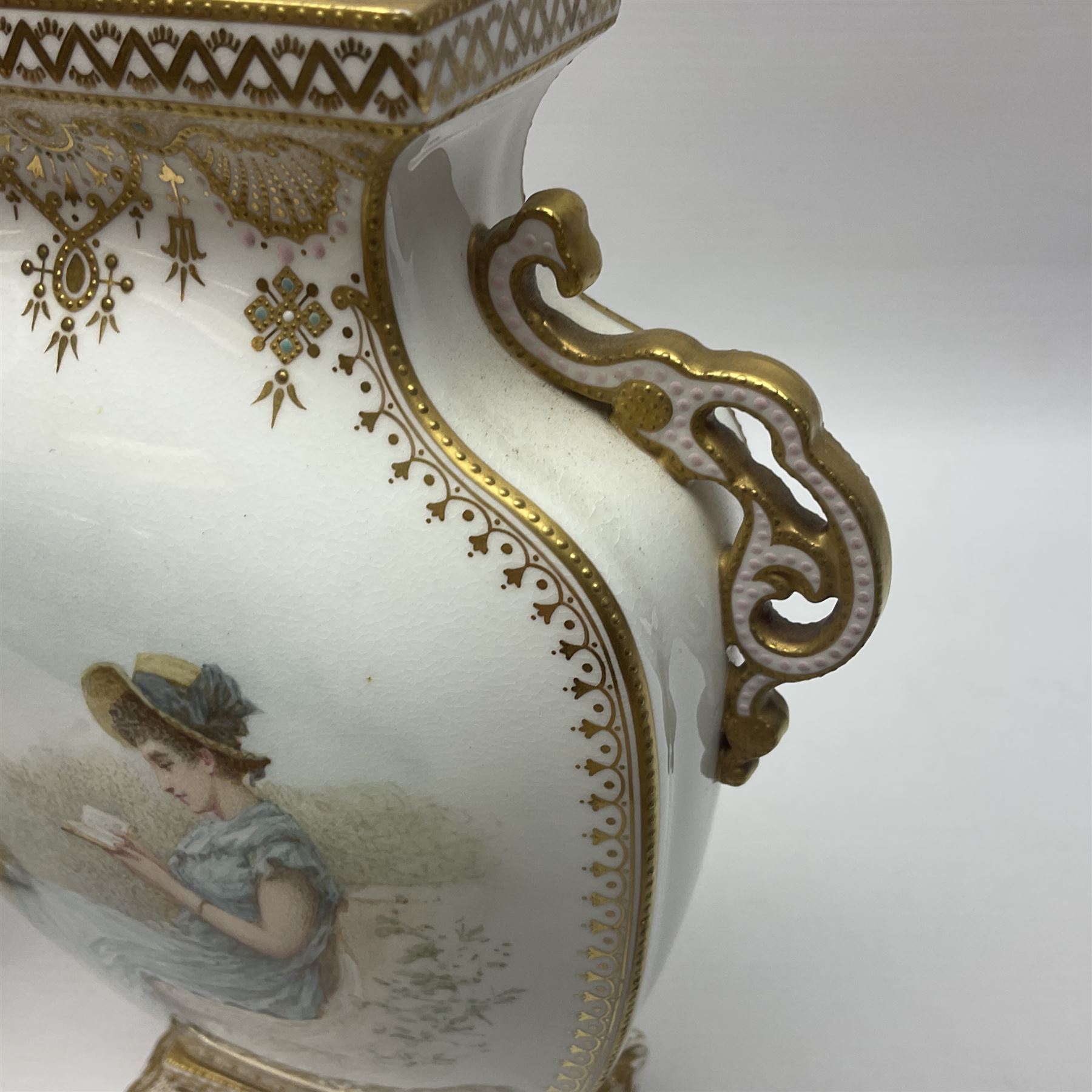 Pair of Copelands enamel jeweled twin handle vases, each decorated with a seated female figures, makers mark beneath, H22cm