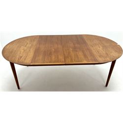 Heals teak extending dining table with two leaves, turned supports