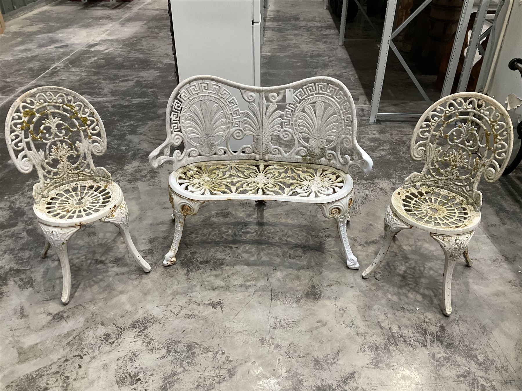 Cast aluminium white painted bench and two chairs - THIS LOT IS TO BE COLLECTED BY APPOINTMENT FROM DUGGLEBY STORAGE, GREAT HILL, EASTFIELD, SCARBOROUGH, YO11 3TX