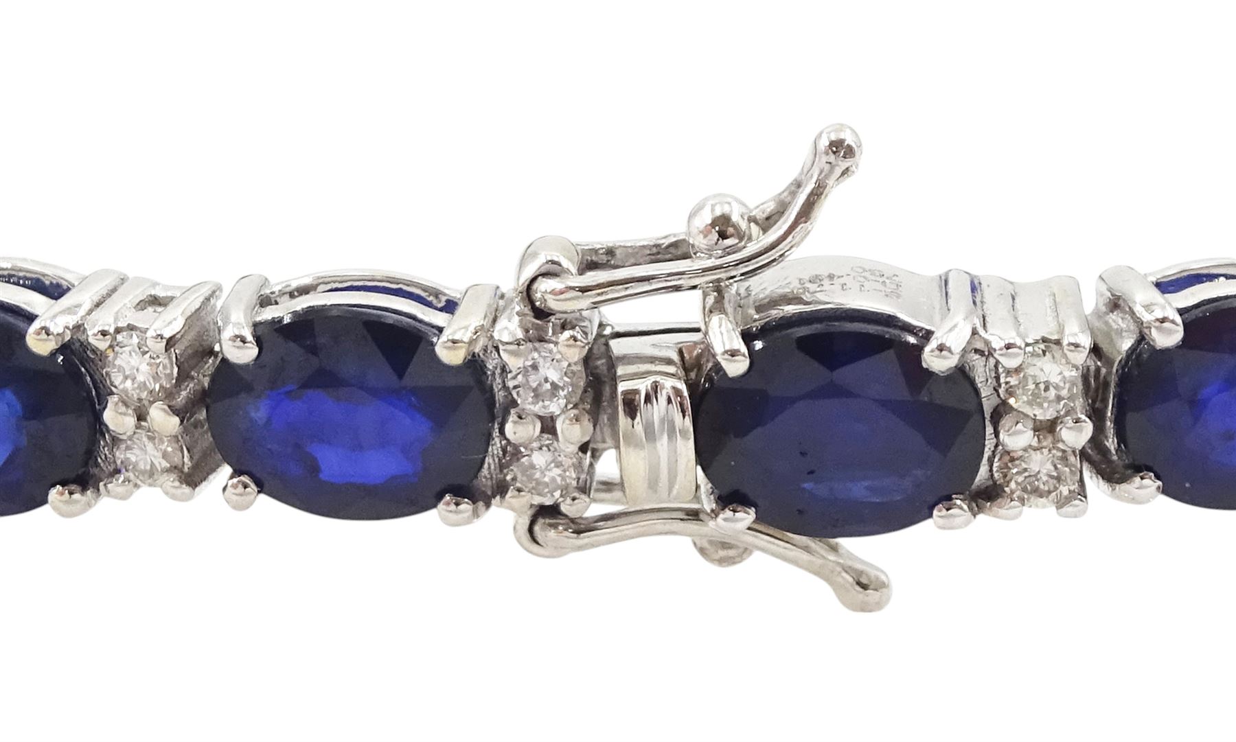 18ct white gold oval cut sapphire and round brilliant cut diamond bracelet, stamped 750, total sapphire weight 11.70 carat, total diamond weight 0.48 carat