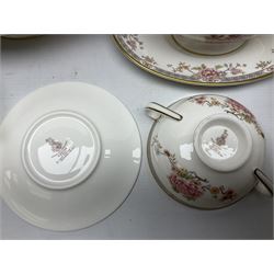 Royal Doulton Canton pattern dinner service for eight covers, comprising dinner plates, side plates, twin handled soup bowls and saucers, dessert plates, one saucer boat and saucer, two covered tureens and one oval dish (37)
