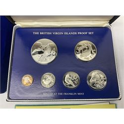 Four British Virgin Islands proof coin sets, comprising First Coinage of the British Virgin Islands 1973 proof six coin set, containing silver one dollar coin, 1977 and 1979 proof sets, containing high denomination silver coins, and The Royal Coronation Jubilee 1977 six coin silver proof set, each minted at the Franklin Mint, all cased with certificates, and a Solomon Islands 1978 proof seven coin set, containing silver five dollar coin, minted at the Franklin Mint, cased with certificate (5)