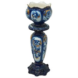 Staffordshire pottery jardiniere, decorated with flowers in blue and heightened in gilt, o...