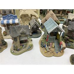 Twenty three Lilliput Lanes, including Village School, Lace's Shoe Shop, Cockles & Muscles, Scotland the Brave etc, together with The Leonardo Collection Paint Box Poppets and Gullivers World magazines 