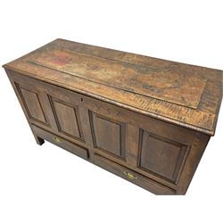 Georgian oak mule chest, moulded rectangular hinged lid over quadruple fielded panel front, the frieze inscribed '17 A Y 57', fitted with two drawers, panelled ends and back, on stile supports