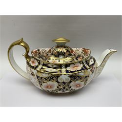 Royal Crown Derby 2451 Imari pattern three piece tea set, comprising teapot, covered sucrier and milk jug, teapot H12cm 