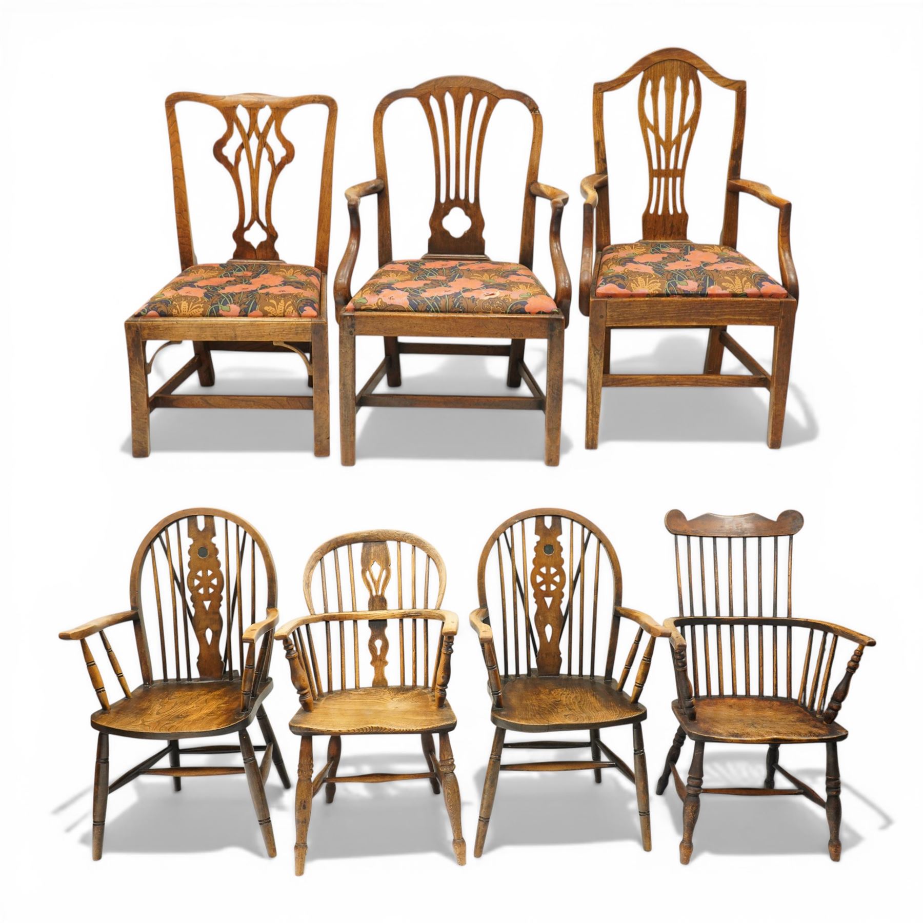 George III oak drop-leaf oval dining table with harlequin set of seven 18th century and later chairs including a comb-back Windsor, the table with turned gatelegs united by box stretcher, shaped apron extending to 212cm, the chairs of various forms, three Windsor carvers, a comb-back Windsor, plus a set of three Georgian mahogany dining chairs, pierced splat backs, with matching drop-in upholstered seats