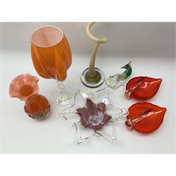 Group of Art Glass, to include Murano examples, including dish of star, a tall vase of twisted form, a goblet vase with lobed orange bowl upon a clear twisted stem and circular foot, a pair of dishes modelled as birds, etc. 

