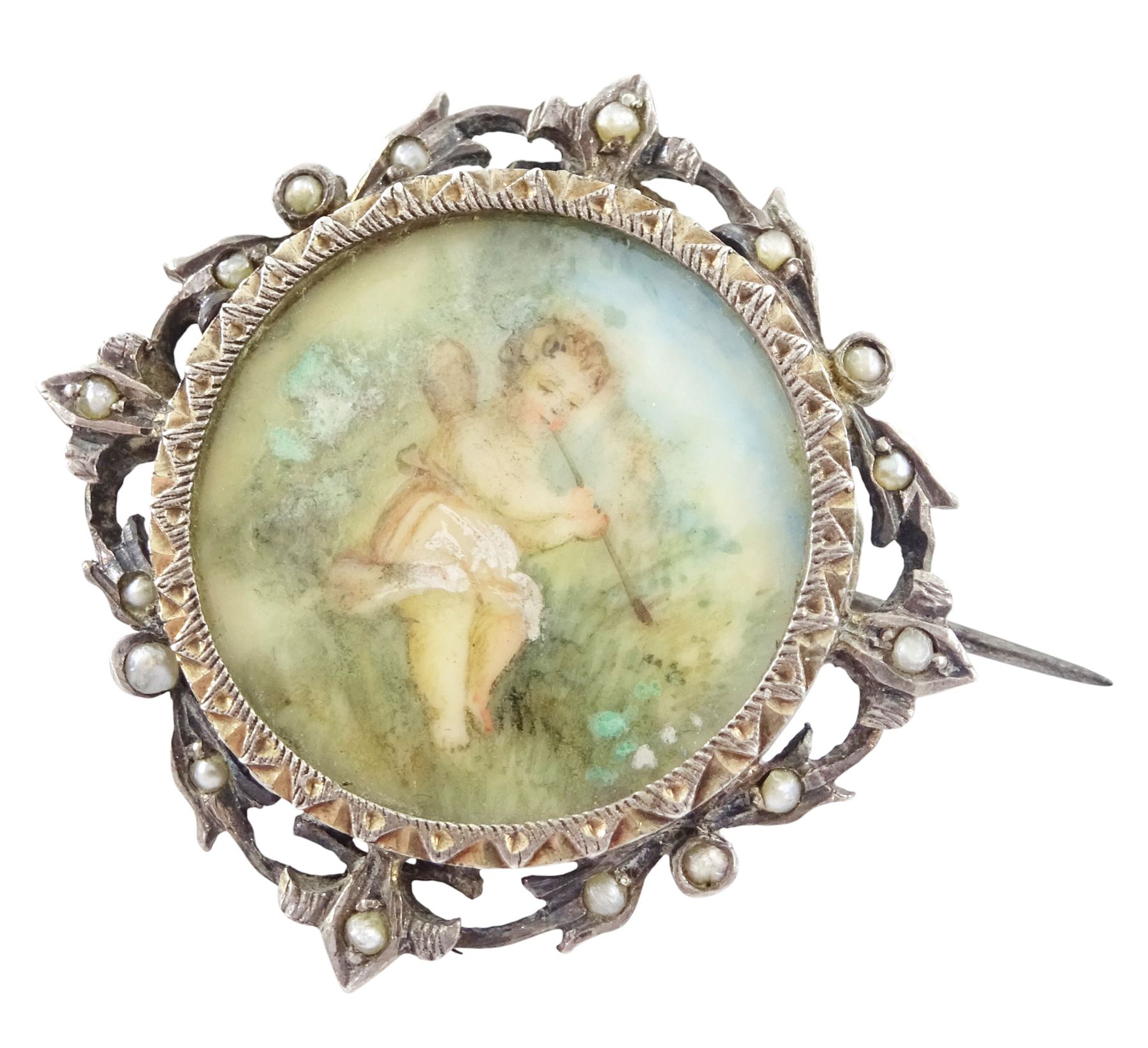 Five 19th century silver portrait brooches, two set with portraits of cherubs and three with women on ivory, three within pierced foliate surrounds. This lot has been registered for sale under Section 10 of the APHA Ivory Act