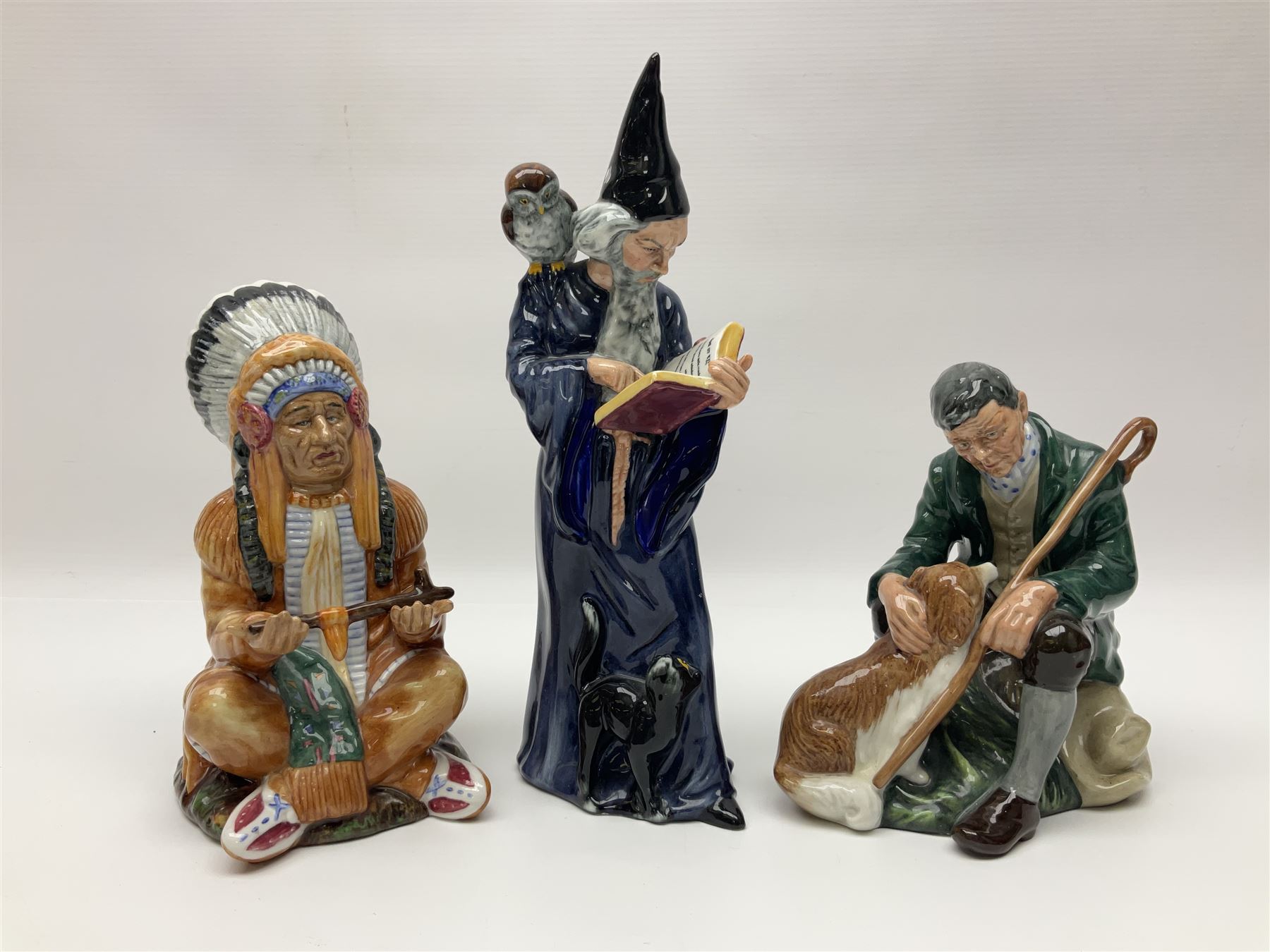 Three Royal Doulton figures, comprising The Wizard HN2877, The Chief HN2892, The Master HN2325