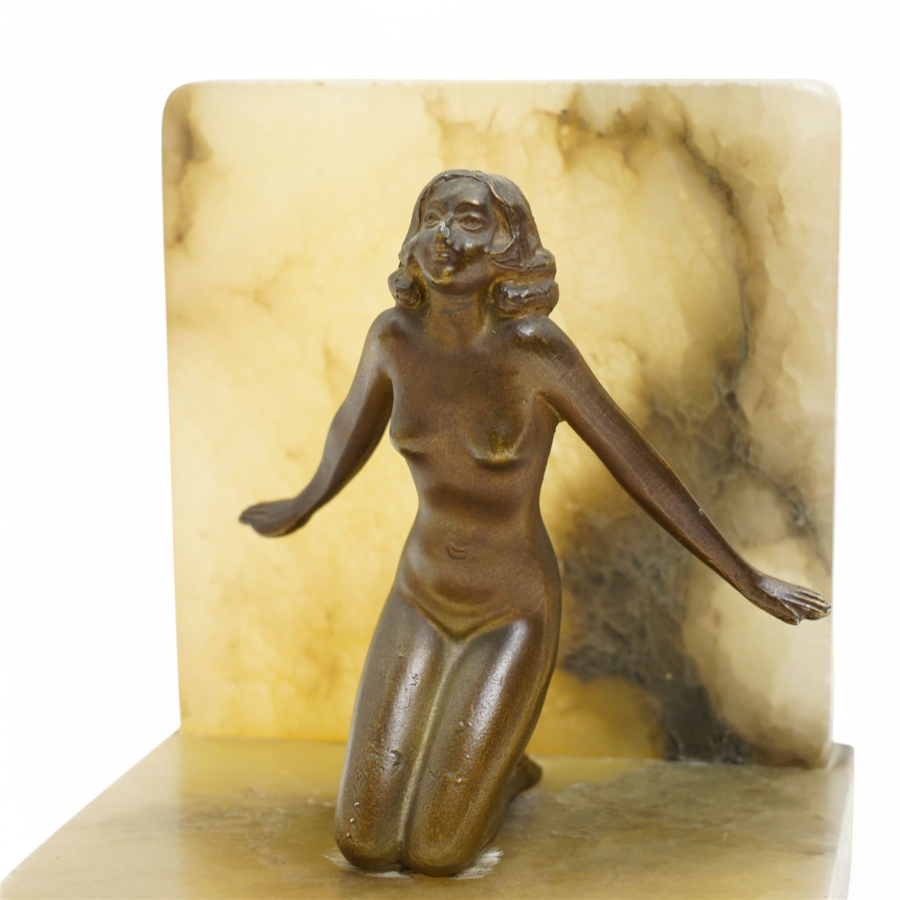Pair of onyx bookends with bronze female figures