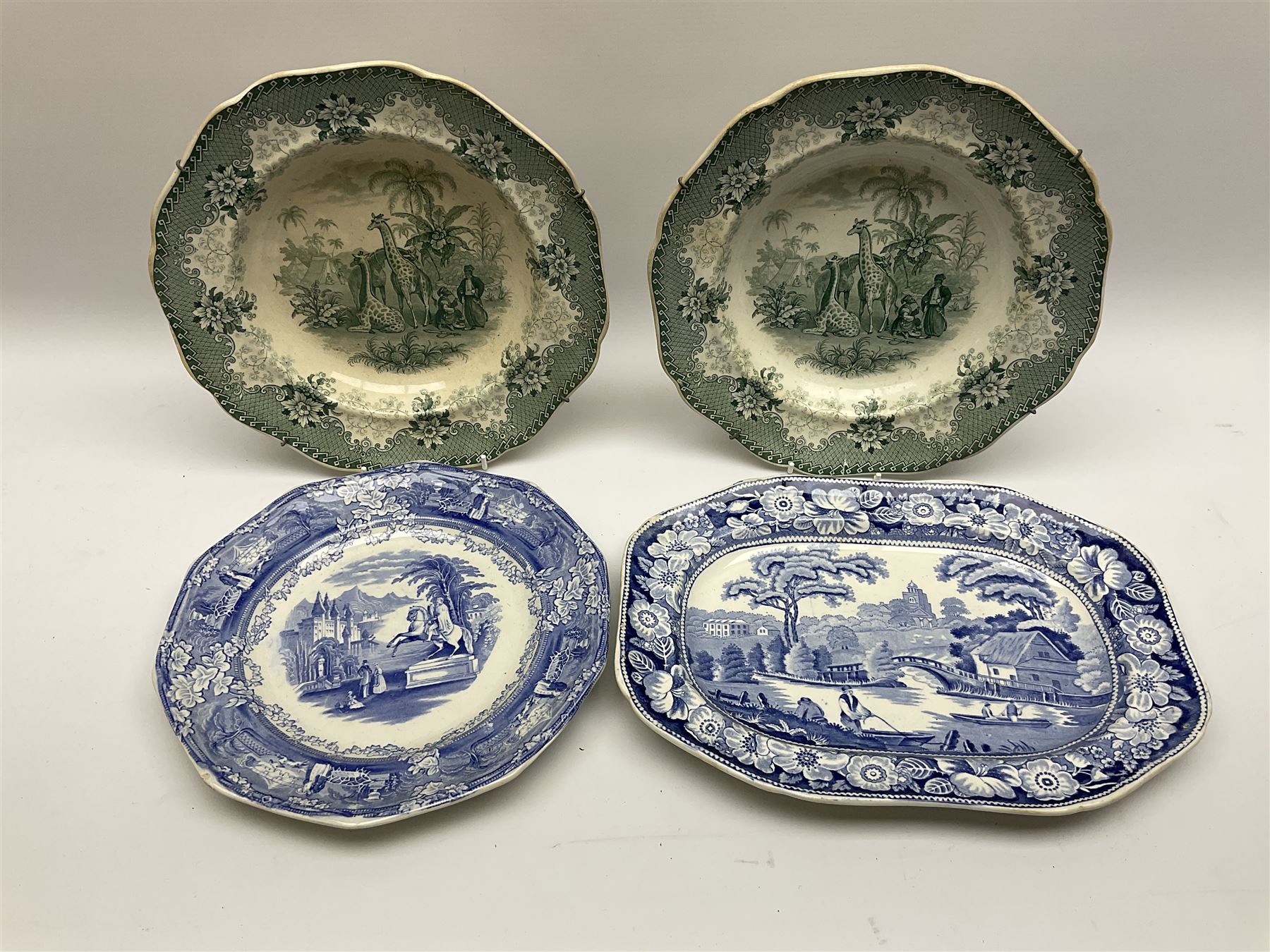 A pair of John Ridgway soup bowls, transfer printed in green with the Giraffe pattern, together with a group of other 19th century blue transfer printed wares, including a pair of Walmer pattern dinner plates. 