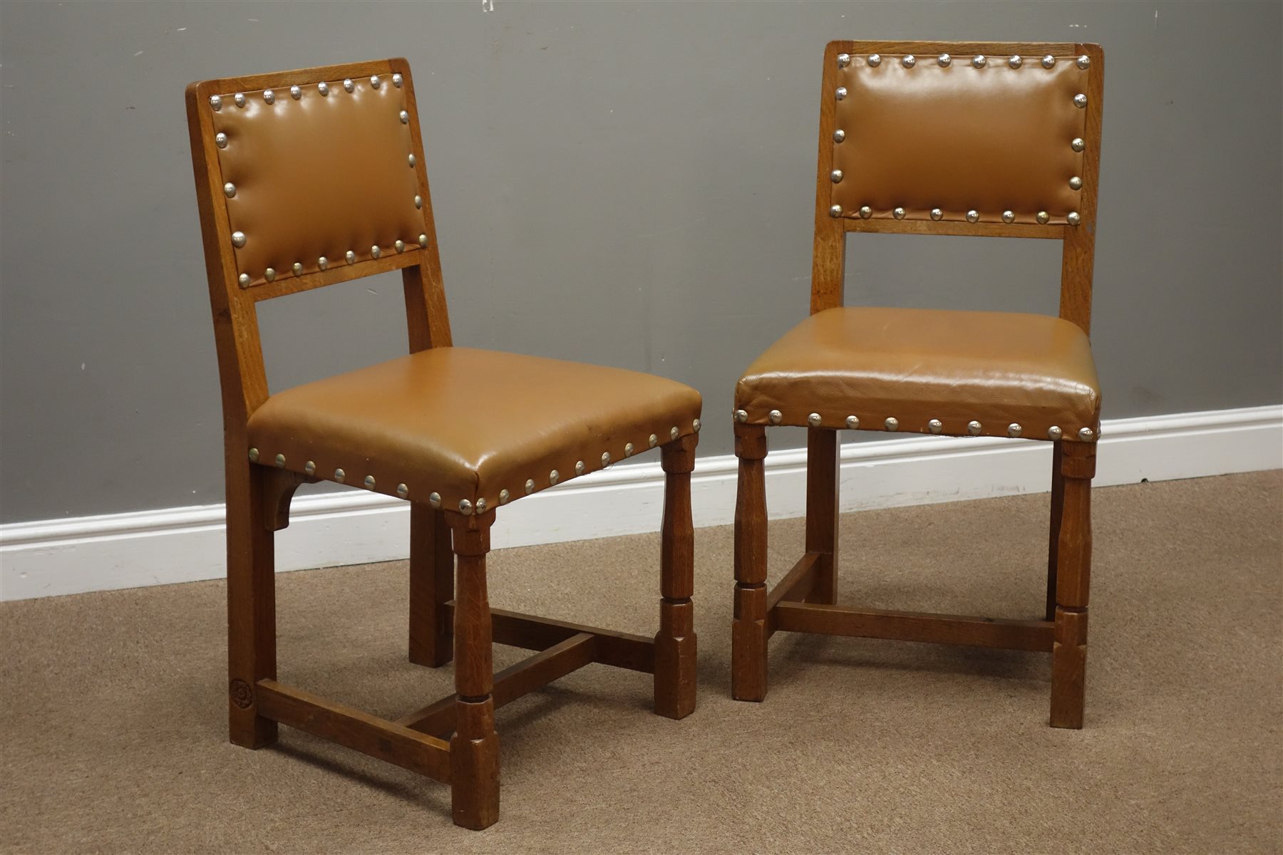 Pair Yorkshire oak dining chairs carved with Yorkshire Rose motif