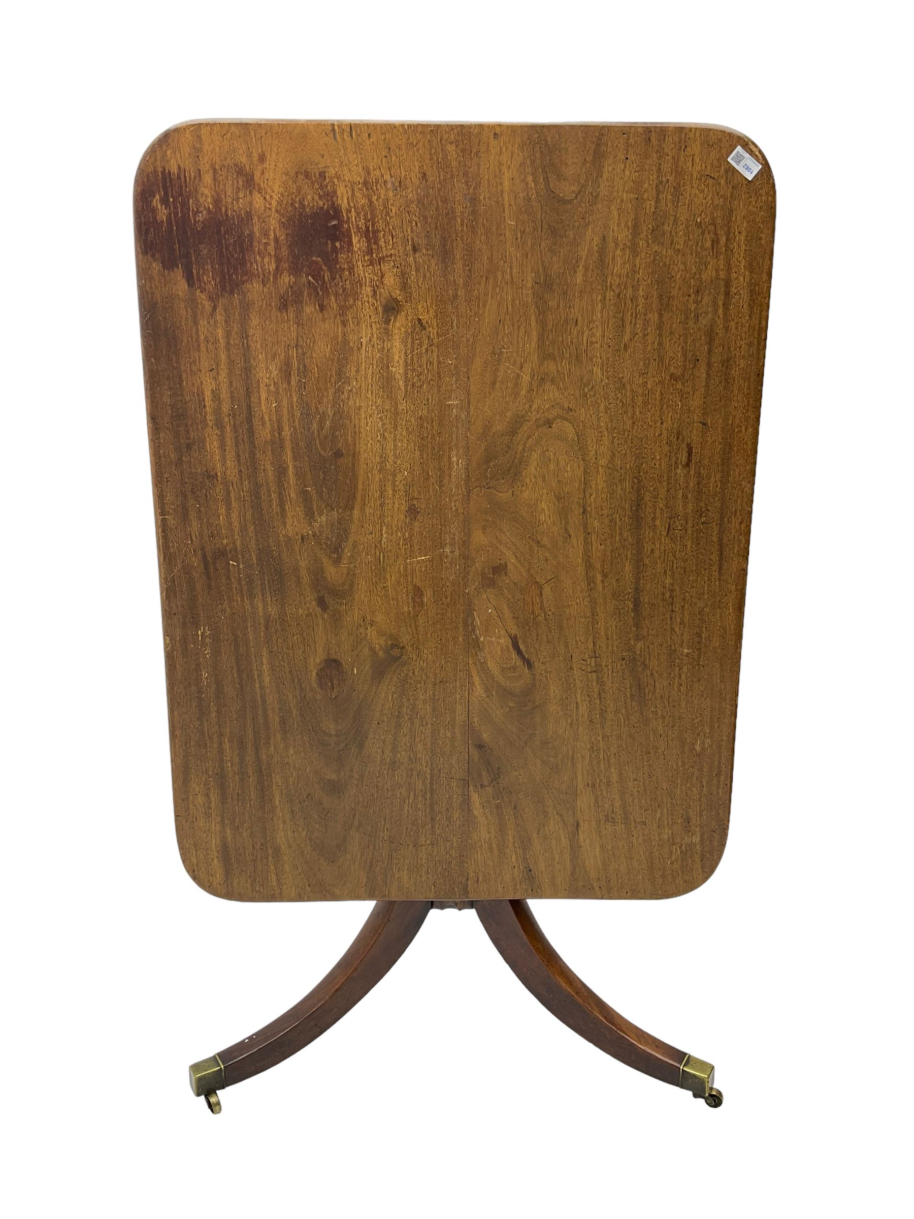 Regency mahogany tilttop salon table, rectangular top with rounded