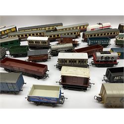 Approximately twenty one passenger coaches including Hornby Pullman, Tri-Ang and Lima, and a quantity of goods wagons to include Hornby examples etc
