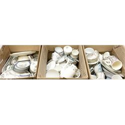 Collection of tea and dinner wares, including an extensive set of 'Christmas Rose' Crown Staffordshire, including tea and coffee wares and two lidded tureens, a blue and white decorated set of cups and saucers, cake stand etc, three boxes . 