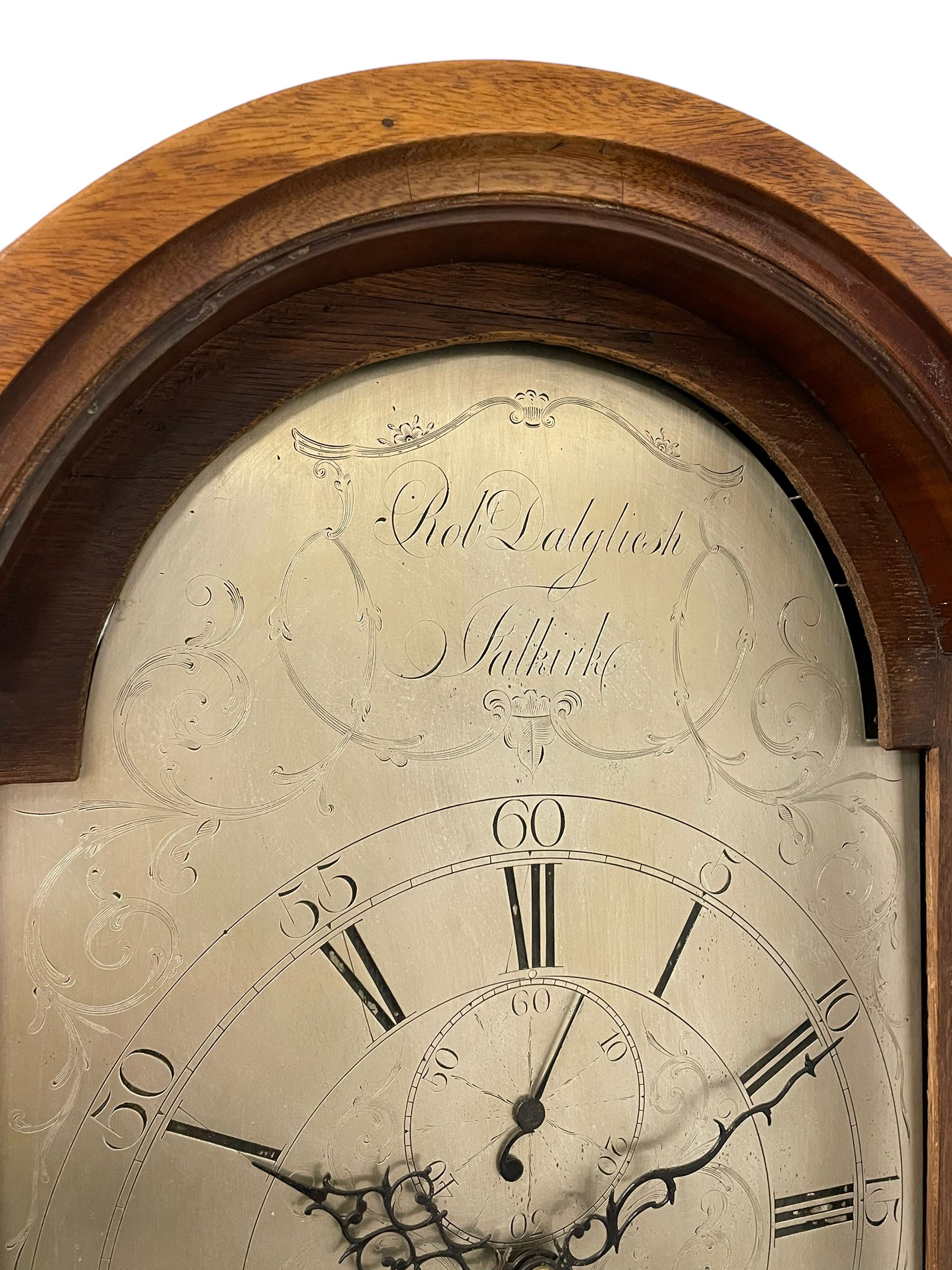 Robert Dalgliesh of Falkirk – Early 19th century 8-day mahogany longcase clock with a break arch pediment and conforming hood door, hood with flanking turned pilasters and brass capitals, trunk with canted corners and spire topped door, on a rectangular plinth with applied shaped skirting, silvered sheet break arch dial with engraving to the spandrels and arch, Roman numerals, five minute Arabic’s and matching steel hands, calendar aperture and seconds dial, with a recoil anchor escapement, rack striking movement, striking the hours on a Bell. With weights and pendulum.