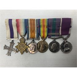 George V Military Cross miniature group of six medals comprising MC, WW1 trio including 1914 Star, Long Service and Good Conduct Medal and General Service Medal with Iraq clasp; and miniature group of four medals comprising Military OBE and WW1 trio including 1914-15 star; all with ribbons and both on pinned wearing bars