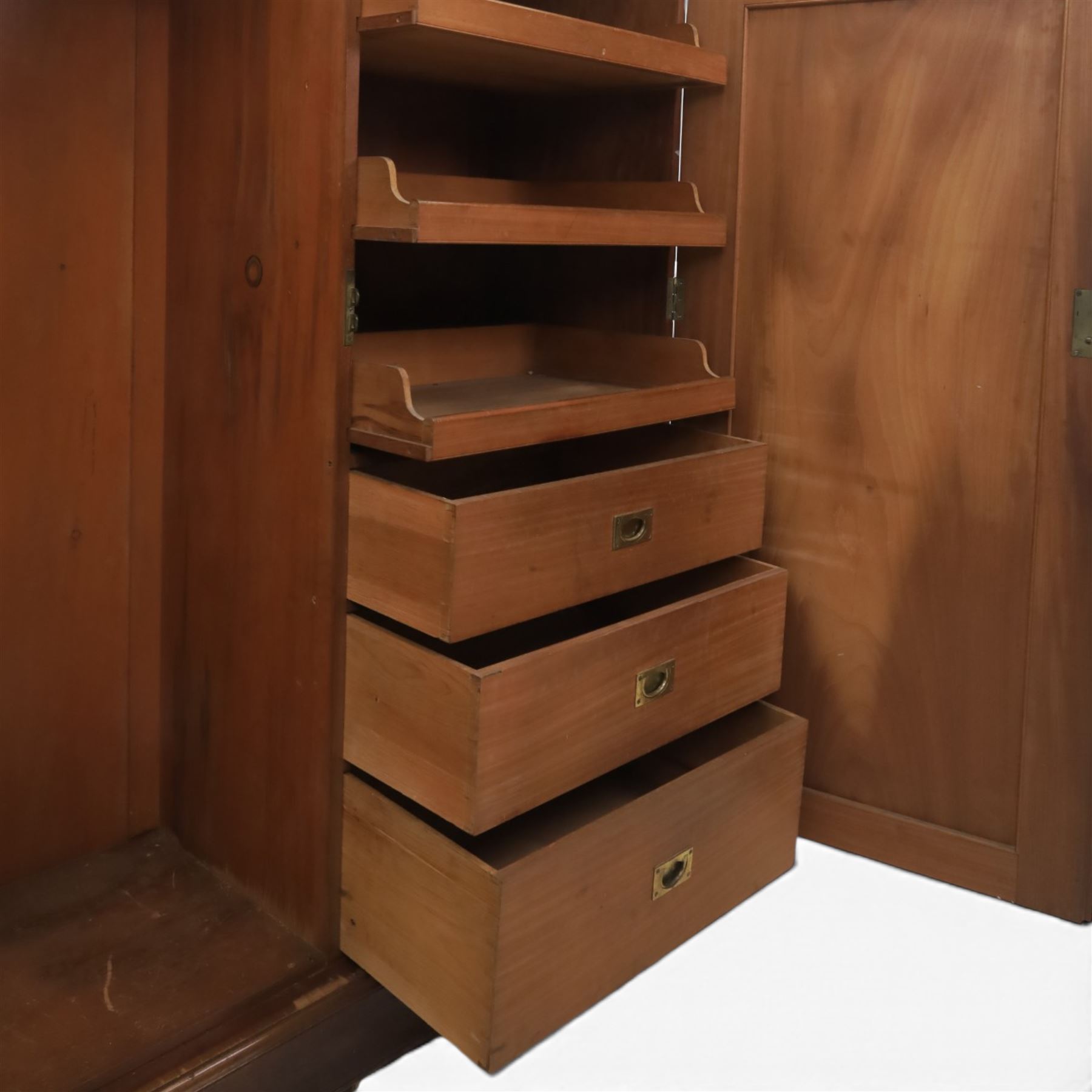 Edwardian walnut double wardrobe, fitted with two panelled doors, opening to reveal fitted interior with hanging space, three sliding linen trays and three drawers