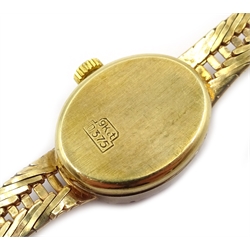  Ladies Swiss 9ct gold wristwatch, diamond and ruby bezel, London import marks   