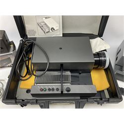 Cased Rollei projector together with a palar projector screen, autofocus slide projector and cenei scoper 360 