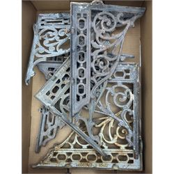 Six early 20th century cast metal wall brackets with scrolled foliate decoration (L35cm, H28cm), and two early 20th century rain hoppers