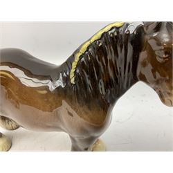 Three Beswick models comprising Hereford Bull no 949, 'CH Cutmil Cupie' Pug, and bay Shire horse, all with printed marks beneath