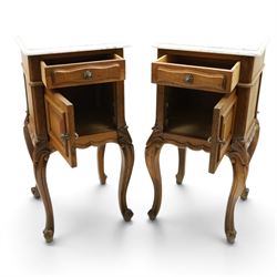 Pair of 20th century French honey oak and marble bedside cabinets, the square marble top with moulded edge, fitted with single drawer over panelled cupboard, shaped and moulded apron over scrolling acanthus leaf applied knees terminating to cabriole legs with scroll feet